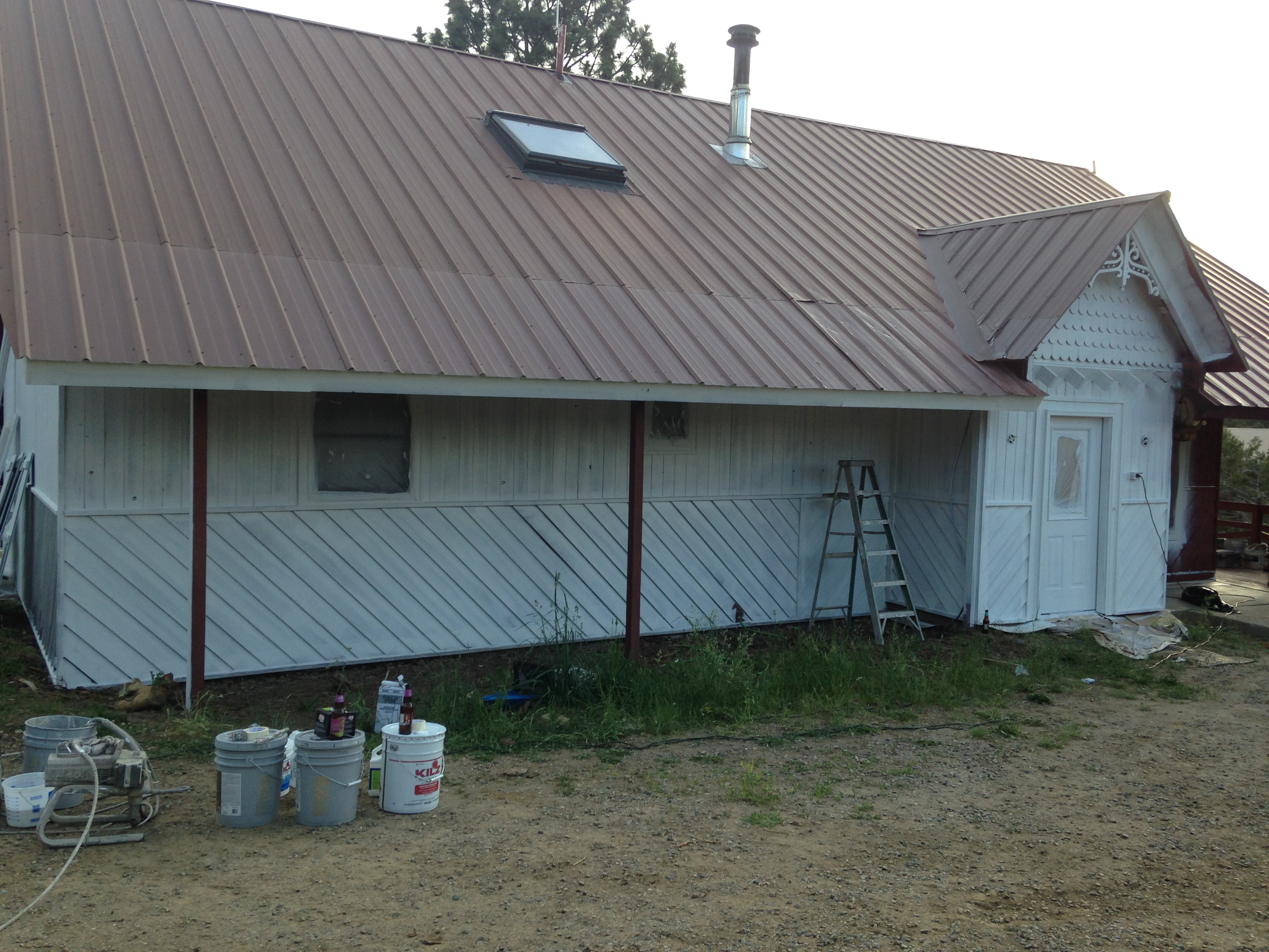 Pop Up Painting - Exterior prime underway